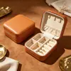 Caja de joyería portátil directa de fábrica con espejo, caja de joyería de lujo de alta gama, caja de almacenamiento de pulsera de cristal, collar, pendientes al por mayor