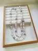 Colar longo de pérolas de alta qualidade, temperamento feminino, versátil, com diamantes em formato de folhas, corrente para suéter, novos acessórios de outono e inverno, atacado
