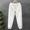 Pantalones jogger holgados para hombre, deportivos casuales, otoño, forro polar, cintura elástica, modernos, versátiles, pantalones largos finos de color liso nuevos