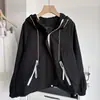 Nova jaqueta corta-vento com zíper estilo coreano retrô color block para mulheres, com capuz ajustável e mangas caídas soltas, adequada para o trajeto