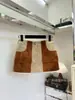 Primero disponible en stock: Conjunto patchwork de ante serie MIU "Shenzhen Nanyou" - chaqueta + falda, shorts y chaleco