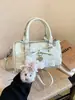 Bolsa de Mão Feminina Fashion Estilo Coreano 2026 Nova com Acabamento em Renda Mochila Estilosa de Alto Valor para Mulheres