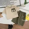 Roupa de Verão para Meninos 2025 Nova Fofa Infantil de Verão com Bolso Gola Redonda Manga Curta Roupas de Verão para Bebê Roupas Infantis