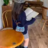 Bolso de Mano para Niñas con Lazo Dulce y Lindo Estilo Coreano Moda Color Sólido Bolso Cruzado para Bebé Nuevo Bolso de Accesorios para Niños