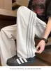 Pantalones deportivos americanos al por mayor transfronterizos para hombre, pantalones de chándal de verano, raya lateral, pantalones casuales para hombre y mujer, marca de moda, pantalones de pierna ancha