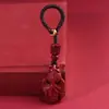 Chaveiro Peixe Dourado de Cinábrio Mineral Cru Alto Teor Roxo Dourado Areia Vermelha Pingente de Ano de Nascimento Venda Direta da Fábrica e Dropshipping