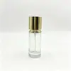 Ventas directas del fabricante: Botellas redondas de vidrio rectas de 40~120 ml con tapas doradas electroplateadas, botellas vacías para esencia, loción y crema, materiales de embalaje