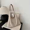 2026 nova bolsa tote de camurça minimalista de nicho da moda estilo coreano, grande capacidade, bolsa de ombro e bolsa transversal versátil