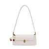 Bolso de axila texturizado casual retro para mujer 2025 nuevo de verano bolso de hombro de nicho francés bolso baguette de moda
