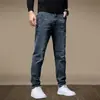 Jeans Grossos Forrados com Lã Outono e Inverno 2026 Marca da Moda Slim Fit Versátil Elástico Macio Calças Longas Masculinas