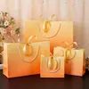 Bolso de Mano Estilo Ins con Degradado Naranja y Decoración de Moño Bolsa de Regalo de Papel Creativa y Hermosa Bolsa para Envolver Regalos