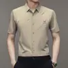 Camisa de hombre para shake voice live verano nueva camisa casual de manga corta para hombre sin planchado alta elasticidad una generación de pelo