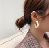Aretes de anillo liso de temperamento simple viento frío alto sentido para mujer aretes al por mayor aretes de aguja de plata 925 aretes de nicho