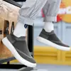 Zapatos casuales para hombre y mujer Four Seasons punta redonda caña baja zapatos de viscosa zapatilla tejida fly knit zapatos de skate slip-on zapatos de moda