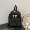 Mochila con lazo para mujer, diseño de nicho, estilo coreano, mochila escolar de moda, ligera, pequeña, para viaje, otoño e invierno, 2024
