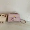 Bolso tote pequeño elegante de alta gama para mujer 2026 nueva moda retro bolso de un solo hombro bolso cruzado exquisito para el día a día