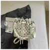 Bolso Cubo Plegado de Mano Estilo Coreano para Mujer Nueva Llegada Primavera Elegante Lujo Ligero Casual Moda Bolso Cruzado de Hombro Único Nicho