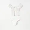 Traje de baño de dos piezas triangular estilo nuevo 2025 para mujer, que disimula el abdomen y estiliza, adecuado para vacaciones en la playa y baños en aguas termales [Disponible para Dropshipping]