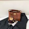 Bolso pequeño de cadena acolchado estilo Chanel con patrón de rombos, un bolso de axila vintage versátil y único, un bolso de mano delicado que se puede llevar en la mano o cruzar sobre el cuerpo