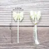 Venta al por mayor Vela de Lazo Individual Hermosa Decoración para Pastel Enchufe Rosa Blanco Caricatura Piruleta Vela de Cumpleaños
