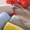 Suéter de punto para mujer otoño e invierno Nuevo Cuello redondo Delgado Sin lana Suéter corto Talla grande Pulóver Camiseta básica Venta al por mayor