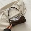Bolso de axila para mujer Otoño Invierno Versátil Viaje Nueva Moda Diseño de nicho Bolso de hombro único Sensación de alta gama Bolso tipo Dumpling