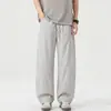 Calças casuais soltas de alta qualidade em estilo japonês com caimento street style, calças largas relaxadas para homens, calças compridas versáteis