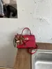 Bolso Pequeño Retro de Alta Gama Transfronterizo Nuevo Bolso de Mano Kelly de Moda para Mujer Bolso de Hombro Cruzado Versátil con Estilo