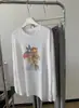 Cubierta protectora solar de Lyocell Tencel para mujer, con estampado floral, cuello redondo, color blanco, mangas largas y diseño de camiseta ultradelgada, adecuada para primavera y verano, y se puede usar como una camisa para aire acondicionado.