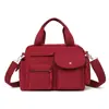 Moda Transfronteiriça 2025 Novo Estilo Bolsa Tote de Grande Capacidade Simples Leve Bolsa de Ombro Transversal Feminina Tecido de Nylon Bolsa para Dor