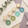 Lançamento de novos produtos: Série floral europeia de 26 letras latão maciço selante para convites de casamento e lembrancinhas de festa