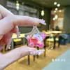 Mini Botella de Arena con Forma de Corazón Llavero Líquido Polvo de Amor Colgante Disco Duro Pequeño Colgante Accesorios de Inyección de Aceite de PVC