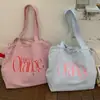 Bolsa Tote com Cordão Estilo Coreano Cor Sólida Estampa de Letras Transfronteiriça Bolsa Pequena de Lona Fresca Feminina Grande Capacidade para o Dia a Dia Bolsa de Ombro Único