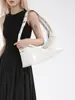 Bolso de Hombro Punk con Remaches de Gran Capacidad Estilo Europeo y Americano Transfronterizo para Mujer 2025 Nueva Moda Bolsito Personalizado para Axila Bolso de Viaje