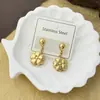Brincos Florais Cruzados Retrô Francês de Aço Inoxidável Dourado para Mulheres Acessórios de Brinco de Aço Titânio de Alta Qualidade Atacado