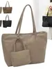 2026 Novo Estilo Simples Bolsa Tote de Grande Capacidade Japonesa e Coreana Casual Versátil para o Dia a Dia Bolsa de Ombro Estudante Bolsa de Aula para Mulheres