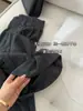 Pantalones de traje para mujer color gris oscuro estilo Old Money, con caída, corte relajado, cintura alta estilizada, pierna ancha, pantalones de largo hasta el suelo para Primavera y Otoño 2026