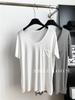 Primavera/Verano 2025/Blanco Perezoso Cuello en U Diseño de Bolsillo Camiseta Base para Mujer Modal Holgada Interior Camiseta de Manga Larga Moderna