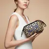 Moda Europeia e Americana Estampa de Leopardo Material de Mergulho Bolsa de Cosméticos Design de Nicho Bolsa para Batom e Cosméticos Bolsa de Higiene Pessoal Portátil para Viagem