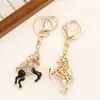 Llavero de Carreras de Caballos de Dibujos Animados Creativos Transfronterizo con Incrustaciones de Diamantes Colgante de Bolso de Moda Accesorios de Llavero de Animal para Coche Venta al por Mayor