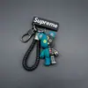 Novo Chaveiro Mecânico de Urso Pingente de Carro Desenho Animado da Moda Decoração Criativa para Bolsa de Casal Chaveiro de Silicone