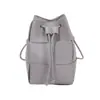 Versão coreana 2026 nova bolsa pequena de nicho para mulheres, bolsa de balde trançada artesanal moderna e de alta qualidade, bolsa transversal versátil