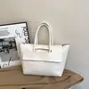 Bolso tote de tapa abatible, de alta gama, minimalista para mujer, nueva colección otoño/invierno 2026, versátil, estilo retro, gran capacidad, adecuado para ir al trabajo.
