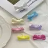 Material de accesorio para el cabello de lazo DIY para niños Accesorios de frijoles de caramelo cremosos funda de teléfono tocado corbata de lazo accesorios de resina agujeros