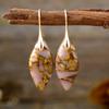 Nuevos pendientes colgantes de hojas de piedra natural bohemios europeos y americanos de moda, joyería retro de estación independiente transfronteriza.
