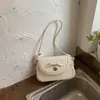 Bolso bandolera de hombro de color liso minimalista estilo coreano para mujer, diseño único con lazo lindo, bolso de mano dulce