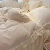 Nuevo conjunto de cuatro piezas de terciopelo de leche bordado estilo princesa con tema de encaje 2026