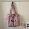Bolsa Tote Grande e Leve Estilo Coreano Moda Feminina 2026 Estampa de Letras Bolsa de Ombro Único para o Dia a Dia Casual Bolsa de Mão