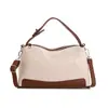 Bolsa creativa de lino a rayas 2026 nueva bolsa de hombro versátil con un tacto elegante y de alta gama, bolsa cruzada casual