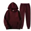 Conjunto de moda de color liso para hombre para primavera y otoño transfronterizo, conjunto de sudadera con capucha y forro polar, conjunto deportivo casual de moda de dos piezas